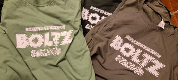Single color screenprint on a variety of Bella Canvas colors for Boltz Strong non profit in Loveland, Ohio