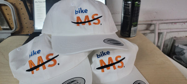 Embroidered unstructured 'dad hats' for national charity Bike MS
