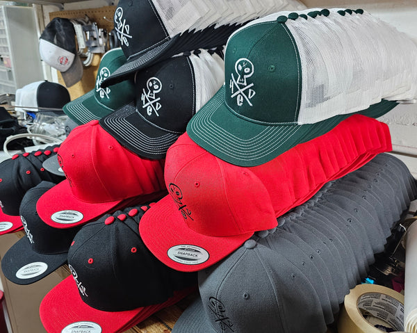 Batch of hats ready to be shipping to London, England to restock nu-metal band Hed PE on their European tour