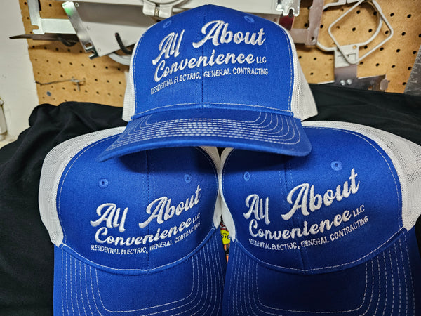 Oversized embroidery on Richardson 112 truckers hats for Norwood, Ohio based All About Convenience, LLC