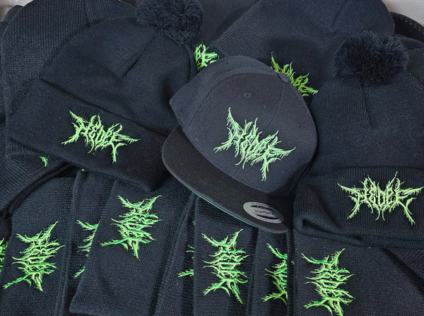 Resupply of embroidered flat bill caps and pom beanies for Hed PE while on tour
