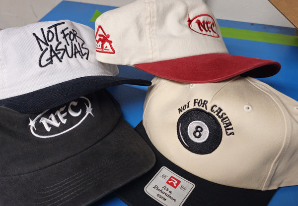Embroidered hats for Not For Casuals underground dance music magazine