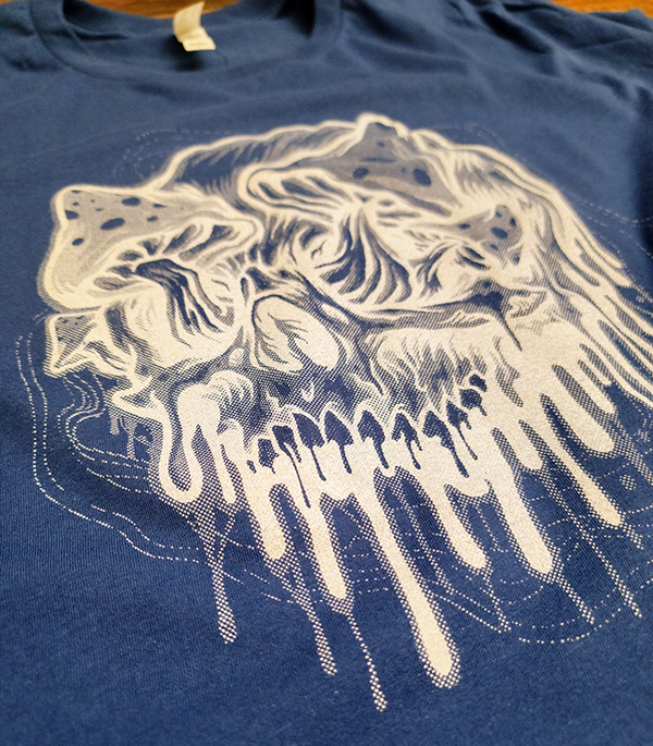 Single color print with very fine halftone dots to give the appearance of shading